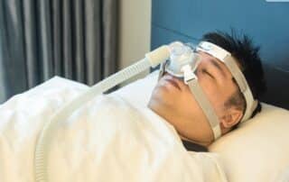 man with cpap machine